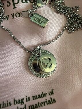 Kate Spade “Spot the Spade" Pave Charm Silvertone Pendant Necklace